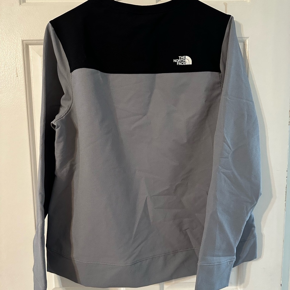 The North Face Women’s  Black and Gray weather resistant sweatshirt